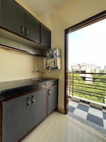 Kitchen in Studio Builder Floor at Ansal Sushant Lok I, Sector 43 – for Rent