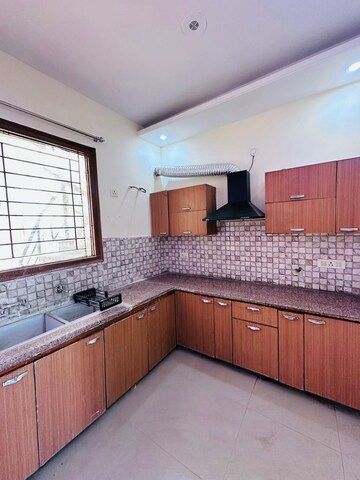 Kitchen in 3 BHK Apartment at Dhakoli Village – for Rent