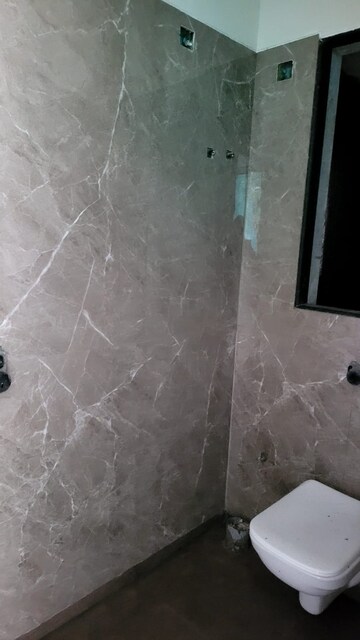 Bathroom in 1 BHK Apartment at Dream Arihant Niwara Sky, Sion – for Sale
