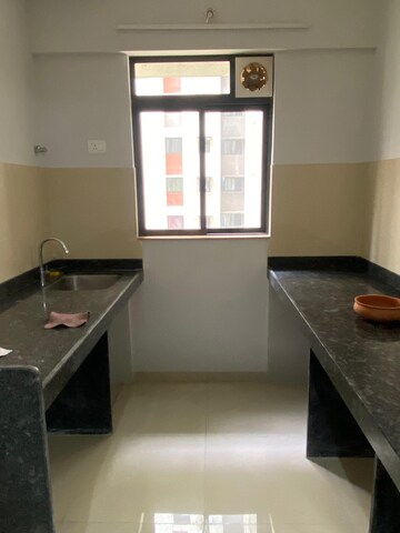 Kitchen in 1.5 BHK Apartment at Lodha Downtown, Dombivli East – for Rent