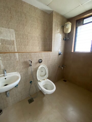 Bathroom in 1.5 BHK Apartment at Lodha Lakeshore Greens, Dombivli East – for Rent