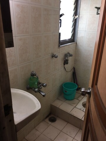 Bathroom in 2 BHK Apartment at Sankalp II, Malad East – for Rent