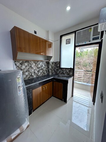 Kitchen in 1 BHK Apartment at DLF City Phase III, Sector 24 – for Rent