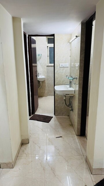 Building Lobby in 2 BHK Apartment at Unitech Palms, South City 1 – for Rent