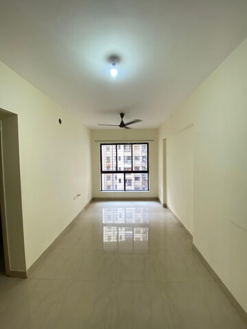 Living Room in 1 BHK Apartment at Lodha Crown Jasmine D E And F, Dombivli East – for Rent