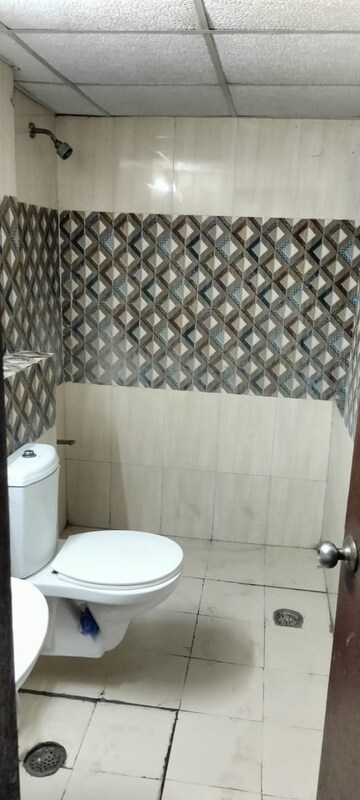Bathroom in 2.5 BHK Apartment at Amrapali Golf Homes, Sector 4, Greater Noida – for Sale