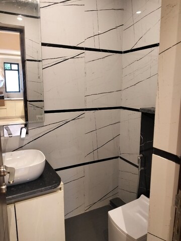 Kitchen in 3 BHK Builder Floor at Ansal Sushant Lok I, Sector 43 – for Sale