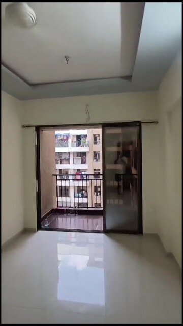 Living Room in 1 BHK Apartment at Vikram Rachna Towers, Virar West – for Rent