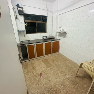 Kitchen in 1 BHK Apartment at Rajanigandha Upvan, Gawand Baug – for Sale