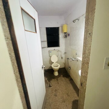 Bathroom in 1 BHK Apartment at Rajanigandha Upvan, Gawand Baug – for Sale