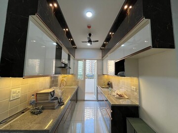 Kitchen in 3 BHK Apartment at 3C Lotus Boulevard, Sector 100 – for Rent