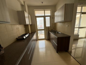 Kitchen in 3 BHK Apartment at Sushma Elite Cross, Dhakoli Village – for Sale