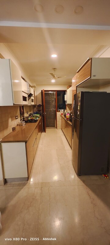 Kitchen in 3 BHK Builder Floor at Auram Floor, South City 2 – for Sale