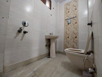 Bathroom in 3 BHK Builder Floor at Paschim Vihar – for Rent