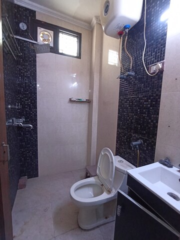 Bathroom in 2.5 BHK Apartment at Paschim Vihar – for Rent
