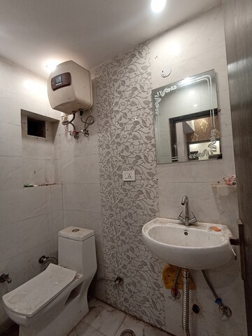 Bathroom in 2.5 BHK Apartment at Paschim Vihar – for Rent