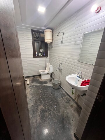 Bathroom in 2 BHK Builder Floor at Chattarpur – for Rent