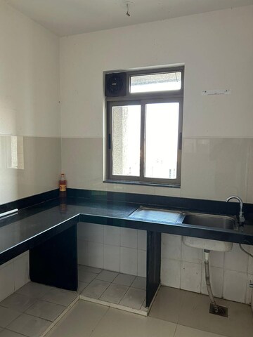 Kitchen in 1 BHK Apartment at Lodha Splendora, Ghodbunder Road – for Rent