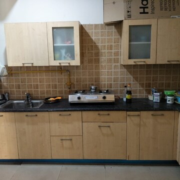 Kitchen in 2 BHK Apartment at Mahagun Mywoods, Sector 16c Greater Noida – for Rent