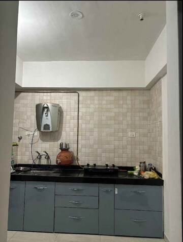 Kitchen in 2 BHK Apartment at Metro Satyam Queens Necklace, Kharghar – for Sale