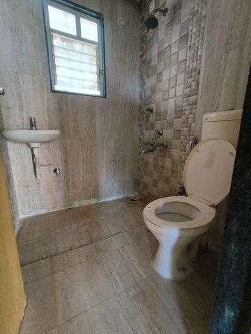 Bathroom in 2 BHK Apartment at Dhankawade Pokale Tamarind Park, Dhayari – for Sale
