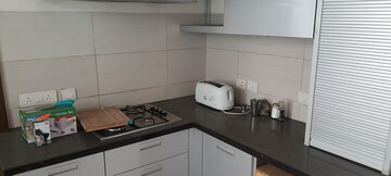 Kitchen in 3.5 BHK Apartment at Vipul Greens, Sector 48 – for Rent