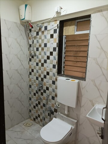 Bathroom in 1 BHK Apartment at Dharti Pressidio, Kandivali West – for Sale