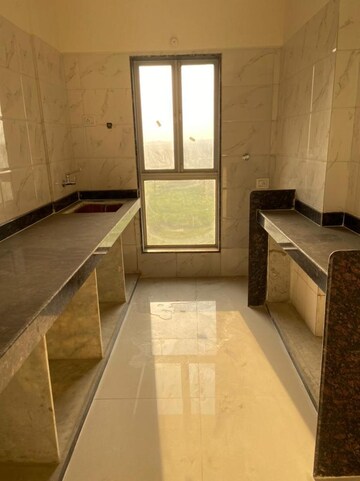 Kitchen in 1 BHK Apartment at Dharti Pressidio, Kandivali West – for Sale