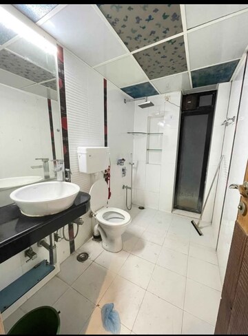 Master Bedroom in 1 BHK Apartment at Metro Satyam Queens Necklace, Kharghar – for Sale