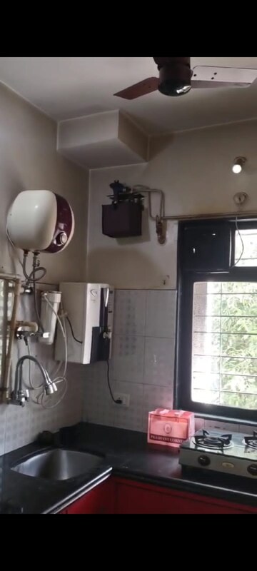 Kitchen in 1 BHK Apartment at Puranik City, Kasarvadavali – for Sale