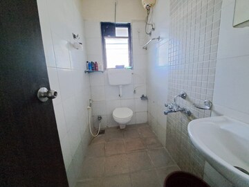 Bathroom in 1 BHK Apartment at Runwal Pearl, Manpada – for Rent