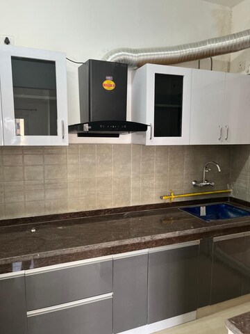 Kitchen in 3 BHK Apartment at Ace Divino, Sector 1 Greater Noida – for Rent