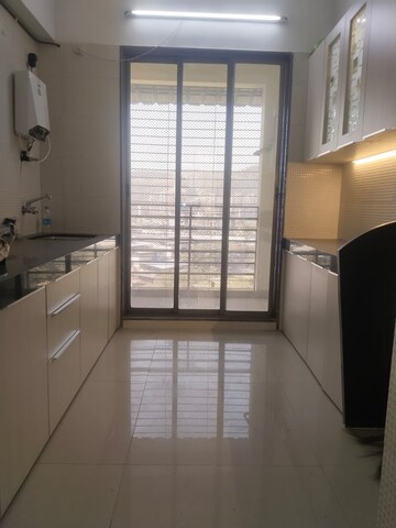 Kitchen in 2 BHK Apartment at Millennium Grand, Kharghar – for Rent