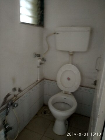 Bathroom in 1 BHK Apartment at New Mhada Tower, Malad West – for Sale