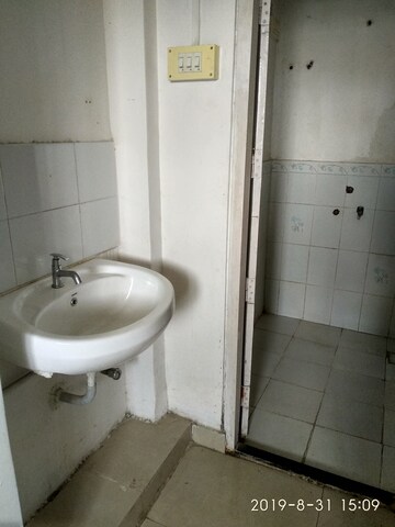 Bathroom in 1 BHK Apartment at New Mhada Tower, Malad West – for Sale