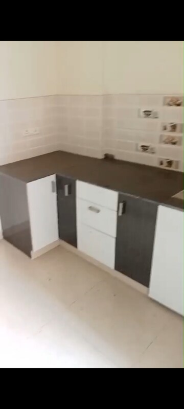 Kitchen in 2 BHK Apartment at Charms Castle Phase II, Raj Nagar Extension – for Rent