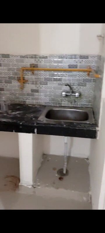 Kitchen in 1 BHK Apartment at Nilaya Greens, Raj Nagar Extension – for Rent