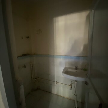 Bathroom in 1 BHK Apartment at Shirke Nisarg CHS, Sion – for Sale