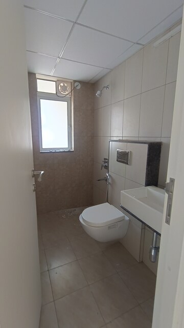 Bathroom in 3 BHK Apartment at Godrej Green Cove, Mahalunge – for Rent