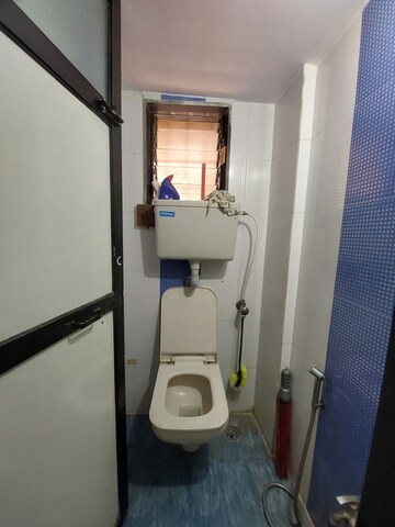 Bathroom in 1 BHK Apartment at Mukund Ritu, Mira Road – for Rent