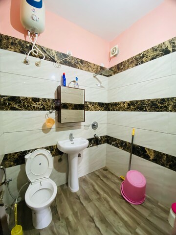 Bathroom in 2 BHK Apartment at Sunny Enclave – for Rent