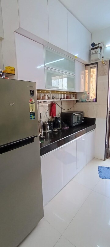 Kitchen in 2 BHK Apartment at GK Royale Rahadki Greens, Rahatani – for Rent
