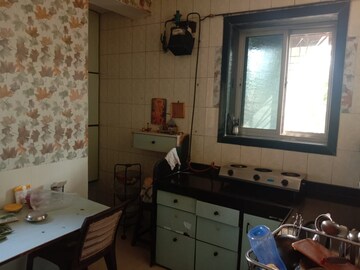 Kitchen in 1 BHK Apartment at The Tenants CHS, Sion – for Rent
