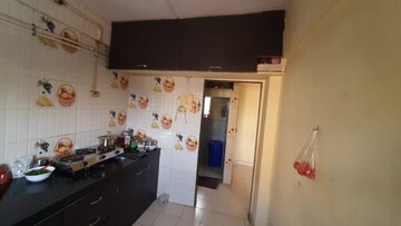 Kitchen in 2 BHK Apartment at Lokgram Complex, Kalyan East – for Sale