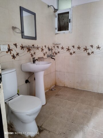 Bathroom in 3 BHK Apartment at Mahagun Moderne, Sector 78 – for Rent