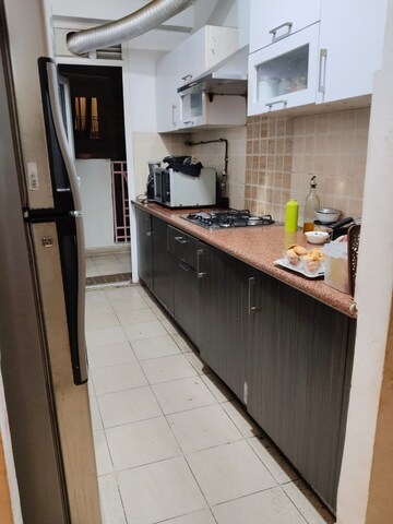 Kitchen in 3 BHK Apartment at Mahagun Moderne, Sector 78 – for Rent