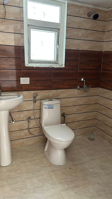 Bathroom in 3 BHK Apartment at ABA Cleo County, Sector 121 – for Rent