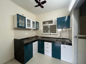 Kitchen in 3 BHK Apartment at Mantra Insignia, Mundhwa – for Rent