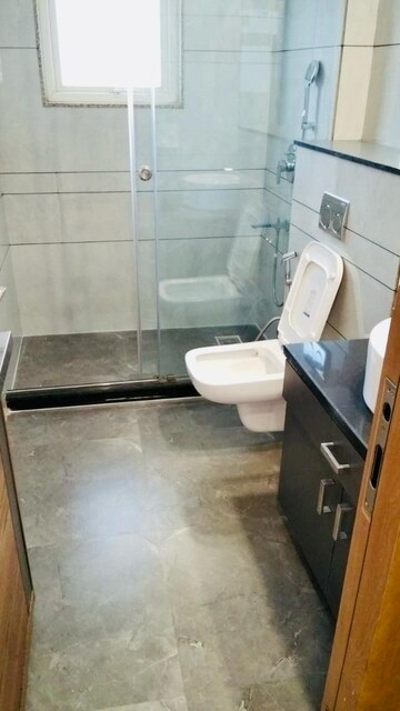 Bathroom in 4 BHK Builder Floor at Ansal Sushant Lok I, Sector 43 – for Rent