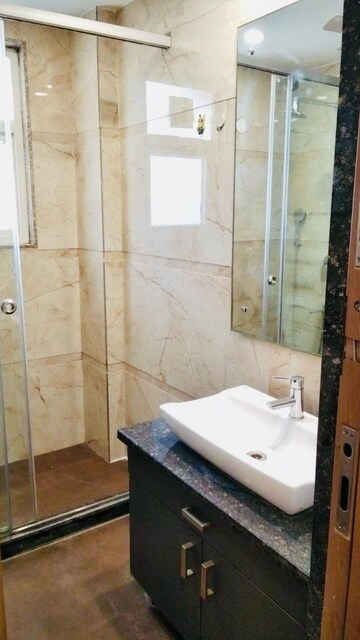 Bathroom in 4 BHK Builder Floor at Ansal Sushant Lok I, Sector 43 – for Rent
